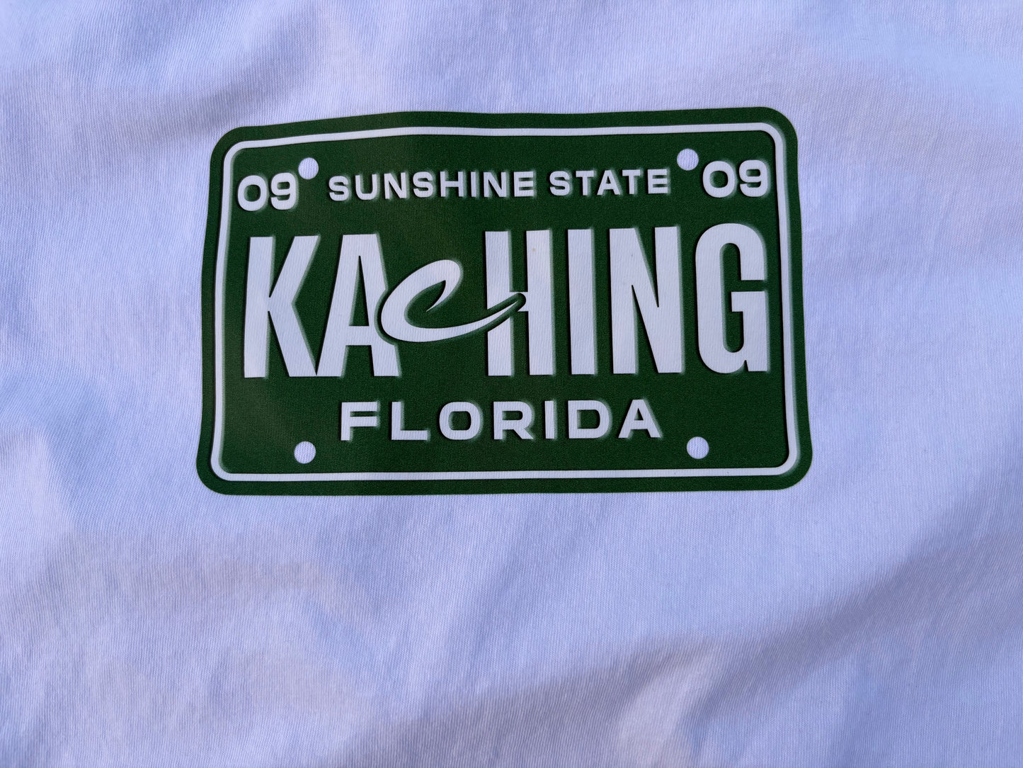 $B x Carela "KACHING" Tee